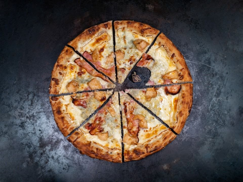 26 .  Pizza Emilianus Family