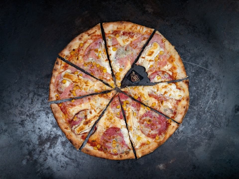 31 . Pizza Quatro Corn Family