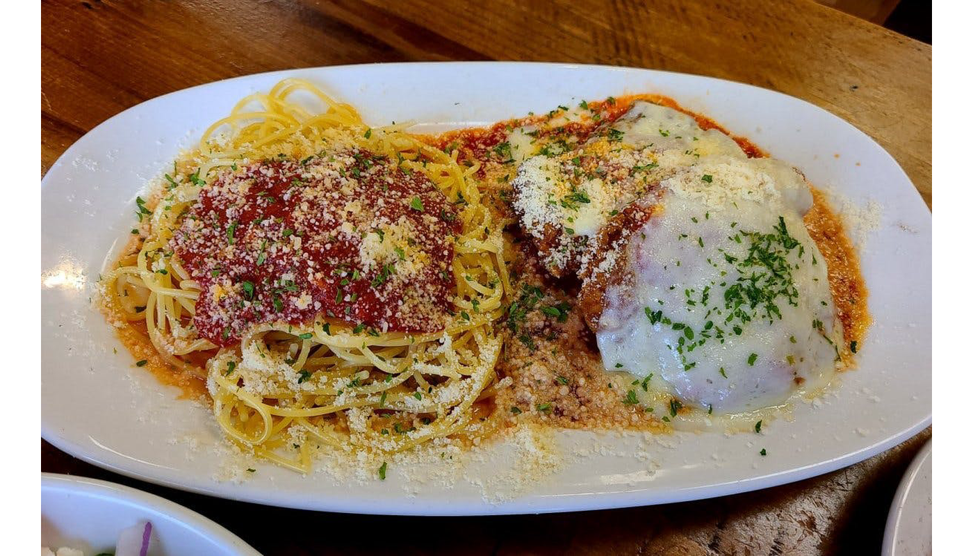 Hand breaded Chicken Parmigiana dinner - Entree