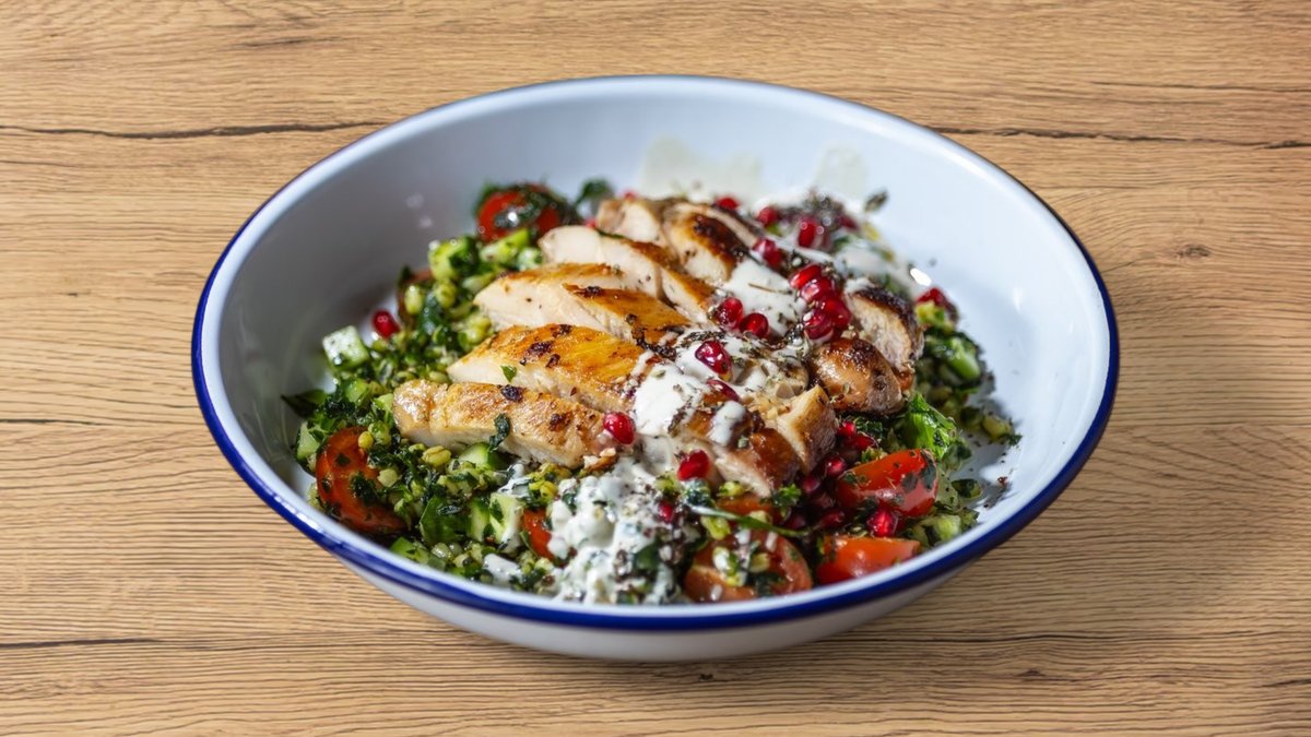 Ginger-lime marinated chicken thigh, tabbouleh, tahini dressing