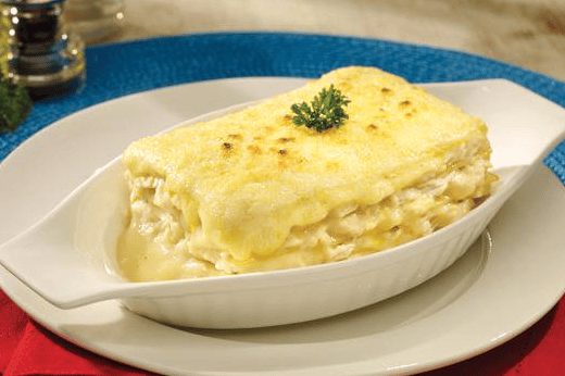 Lasagna Pollo +tostadas +acompañamiento
