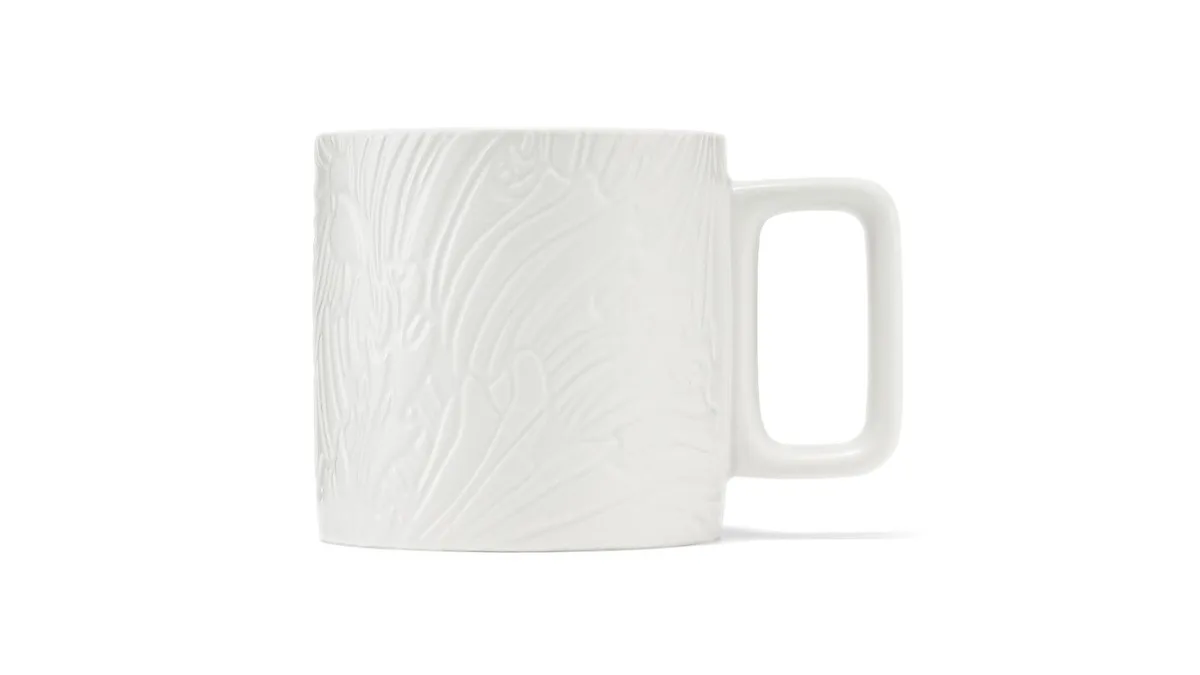 (1139657) White Mug with Embossed Design