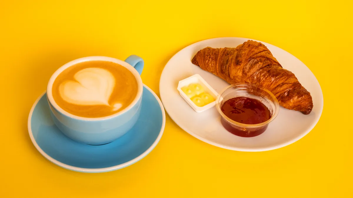 Сroissant with butter and jam