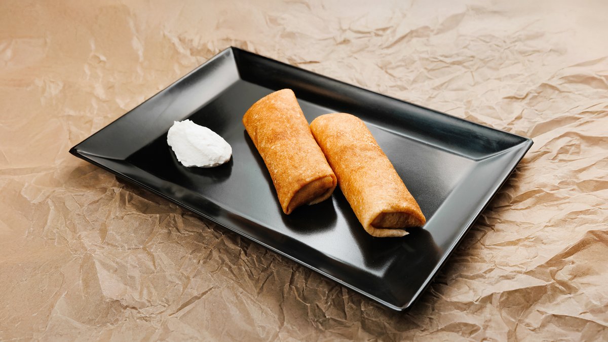 Pancakes with meat and sour cream