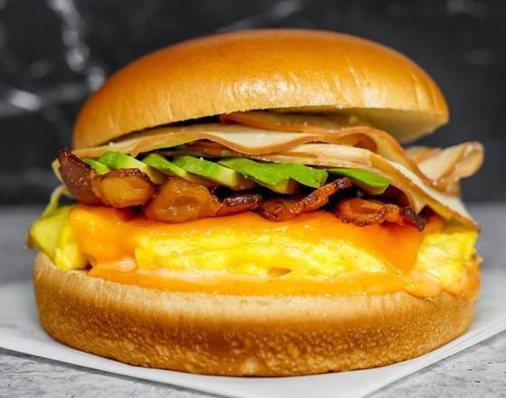 Brioche, Bacon, Turkey, Avocado, Egg, and Cheddar
