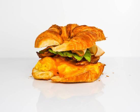 Croissant, Bacon, Turkey, Avocado, Egg, and Cheddar