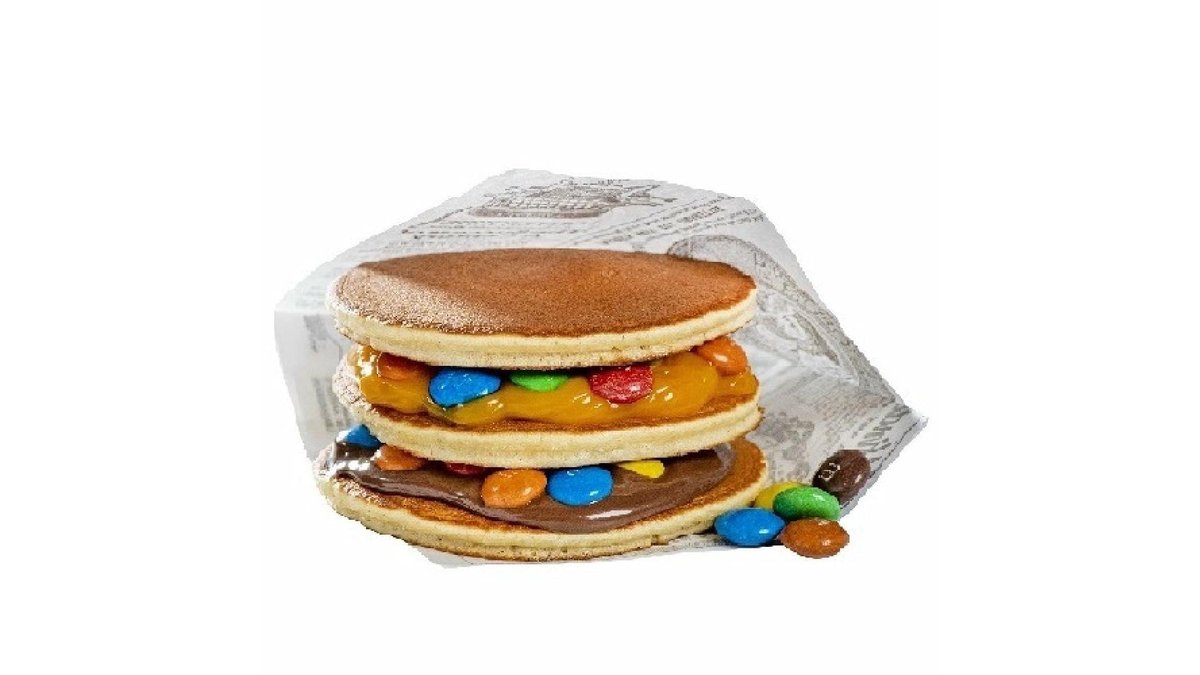 Trio pancakes cu nutella, cremă de portocale și MandM
