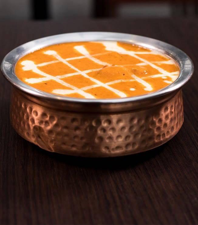 2x1 en Butter Chicken, Plain Naan y Rice