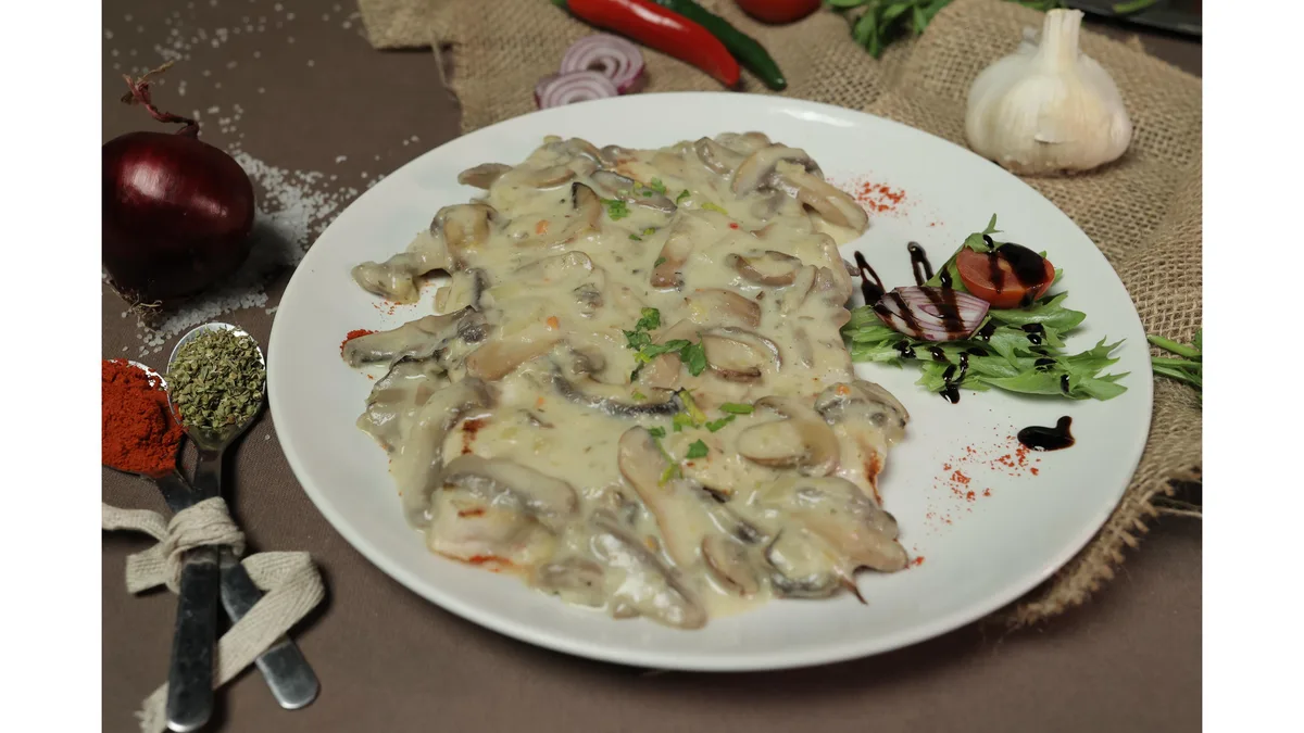 Șnițel de porc cu ciuperci﻿