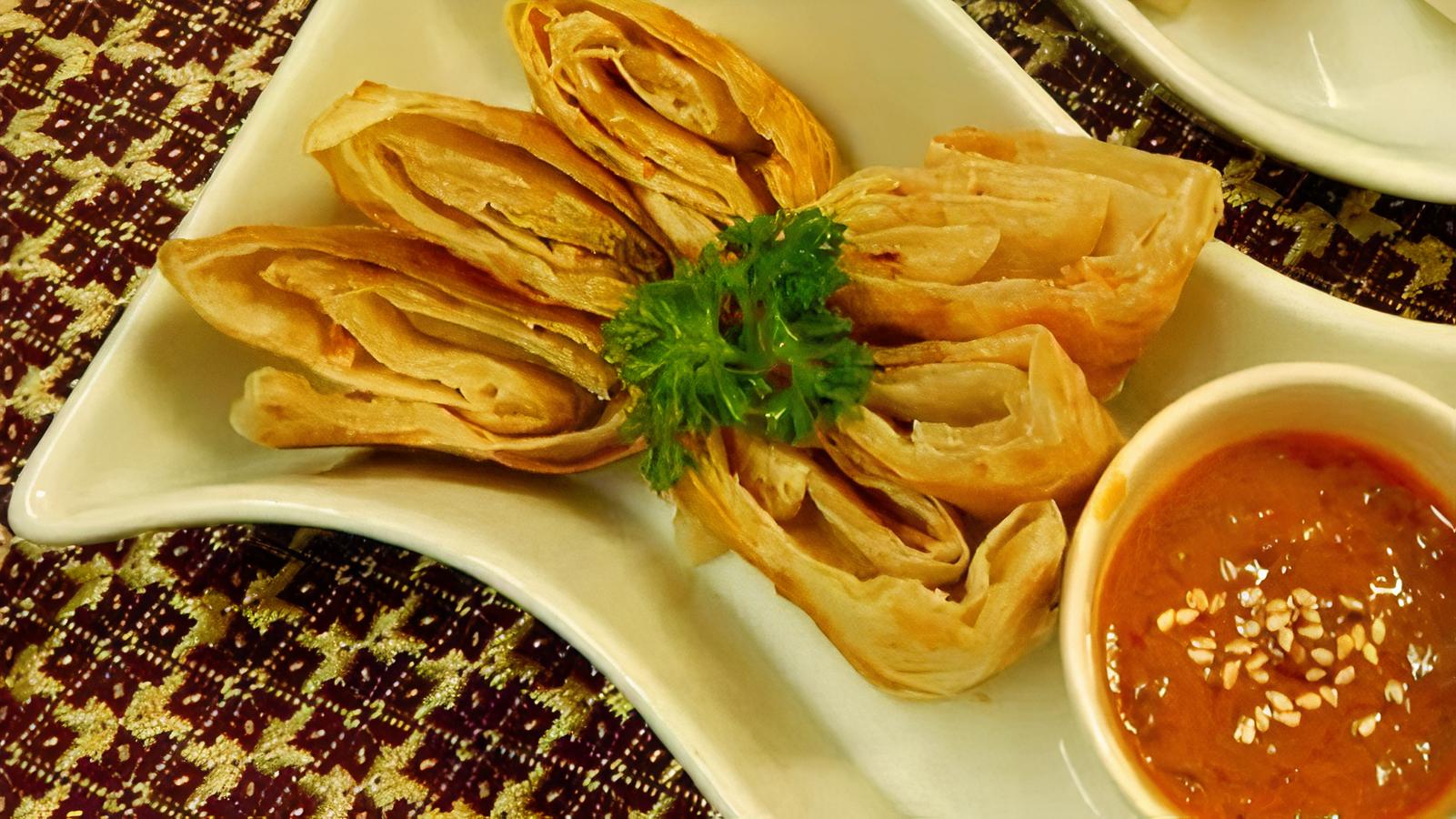 66. Roti Bread Served With Peanut Sauce