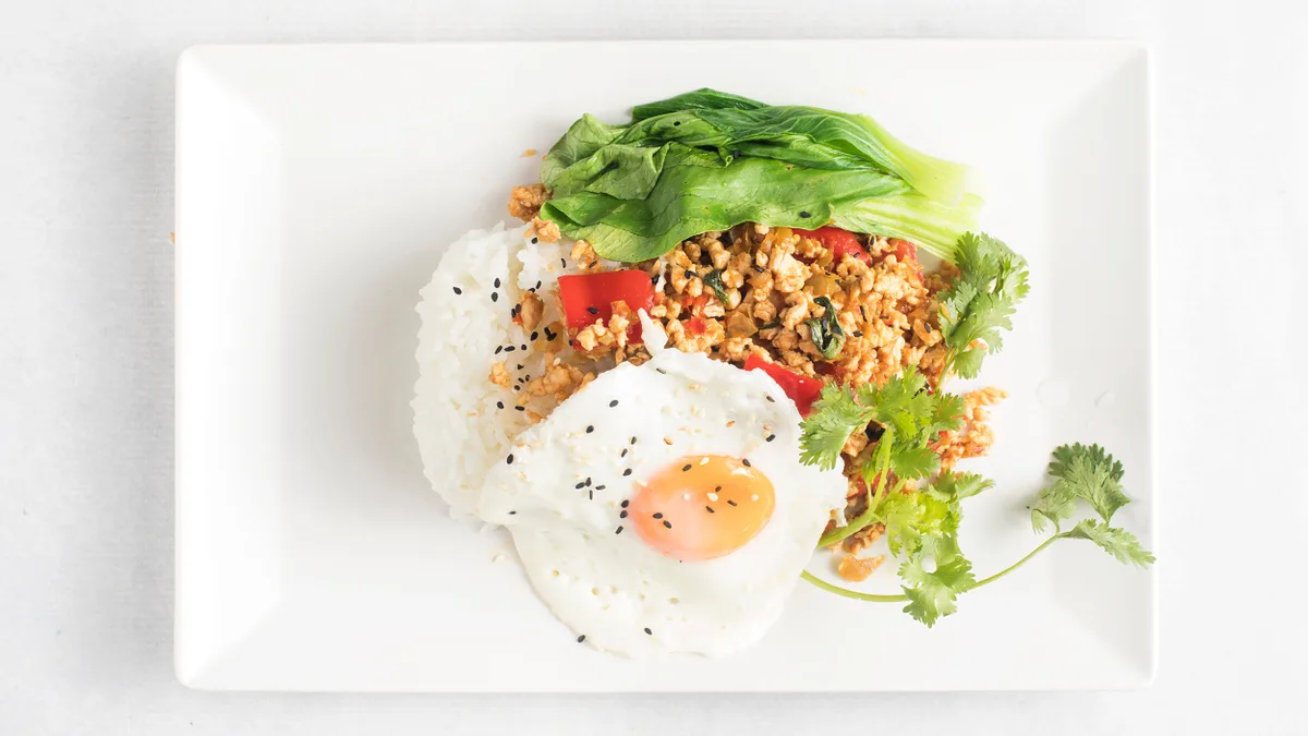 PAD KRA POW PORK WITH RICE and EGG