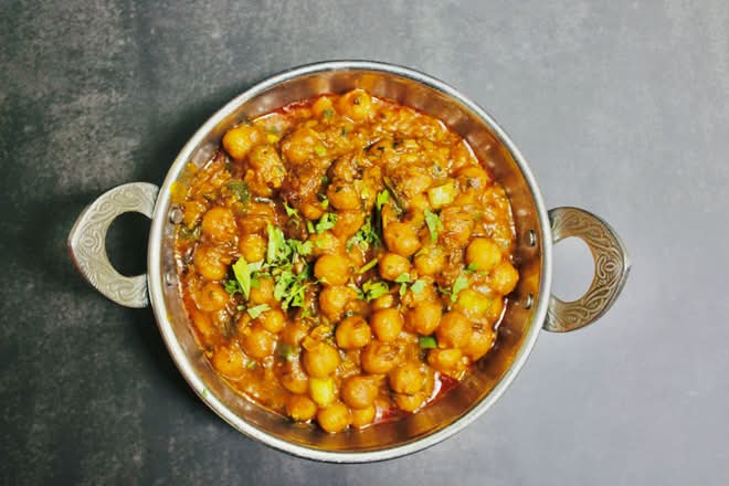 Chana Masala (Vegetarian Curries(All entrees come with rice))