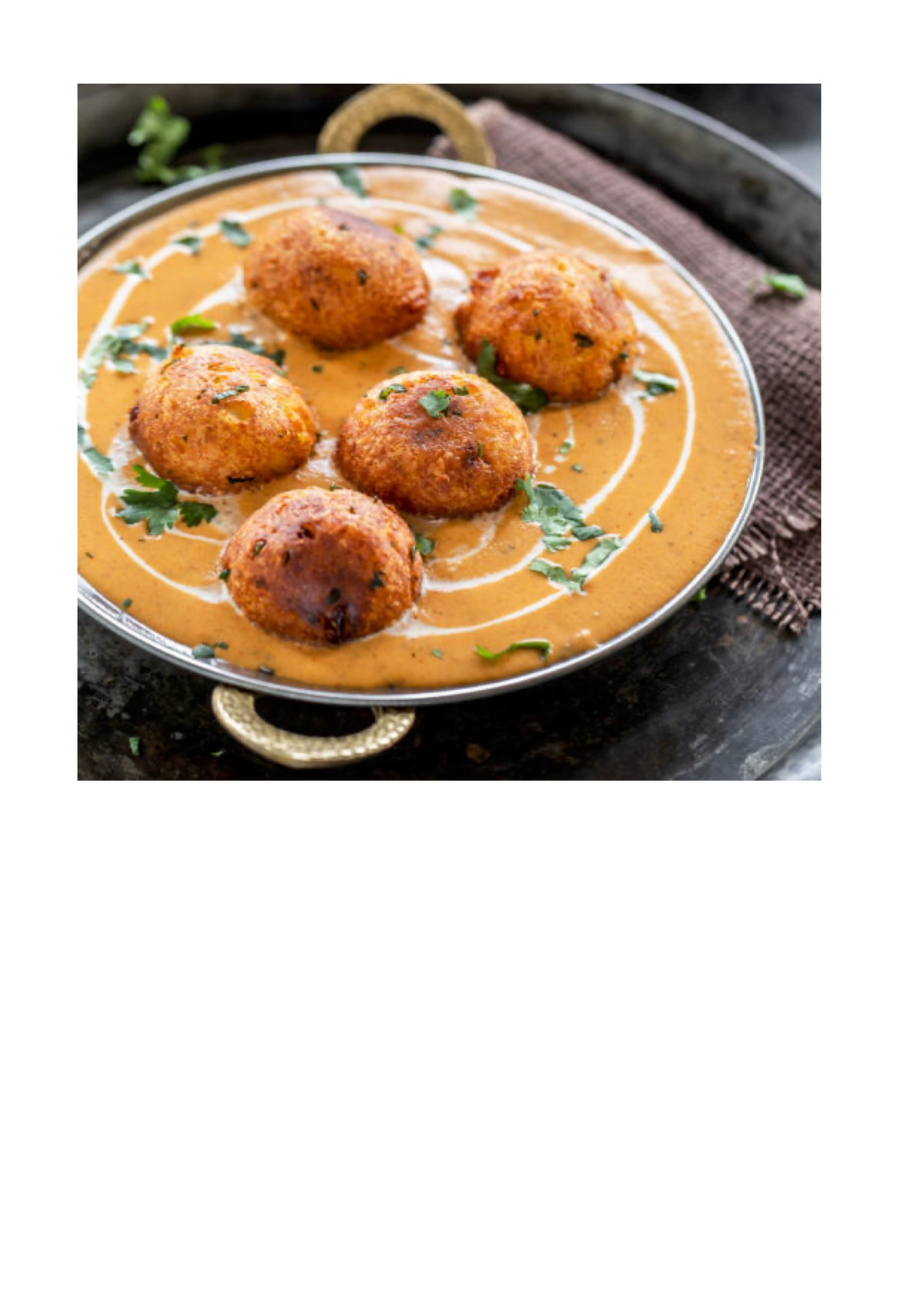 Malaai Kofta (V) serveres med ris.