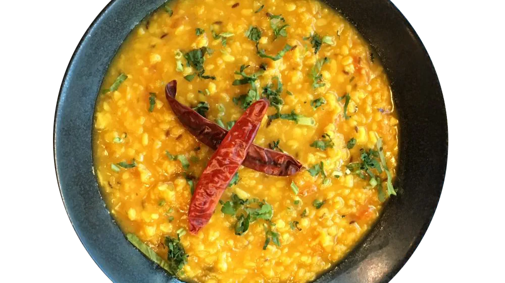 Tadka Daal (V) serveres med ris