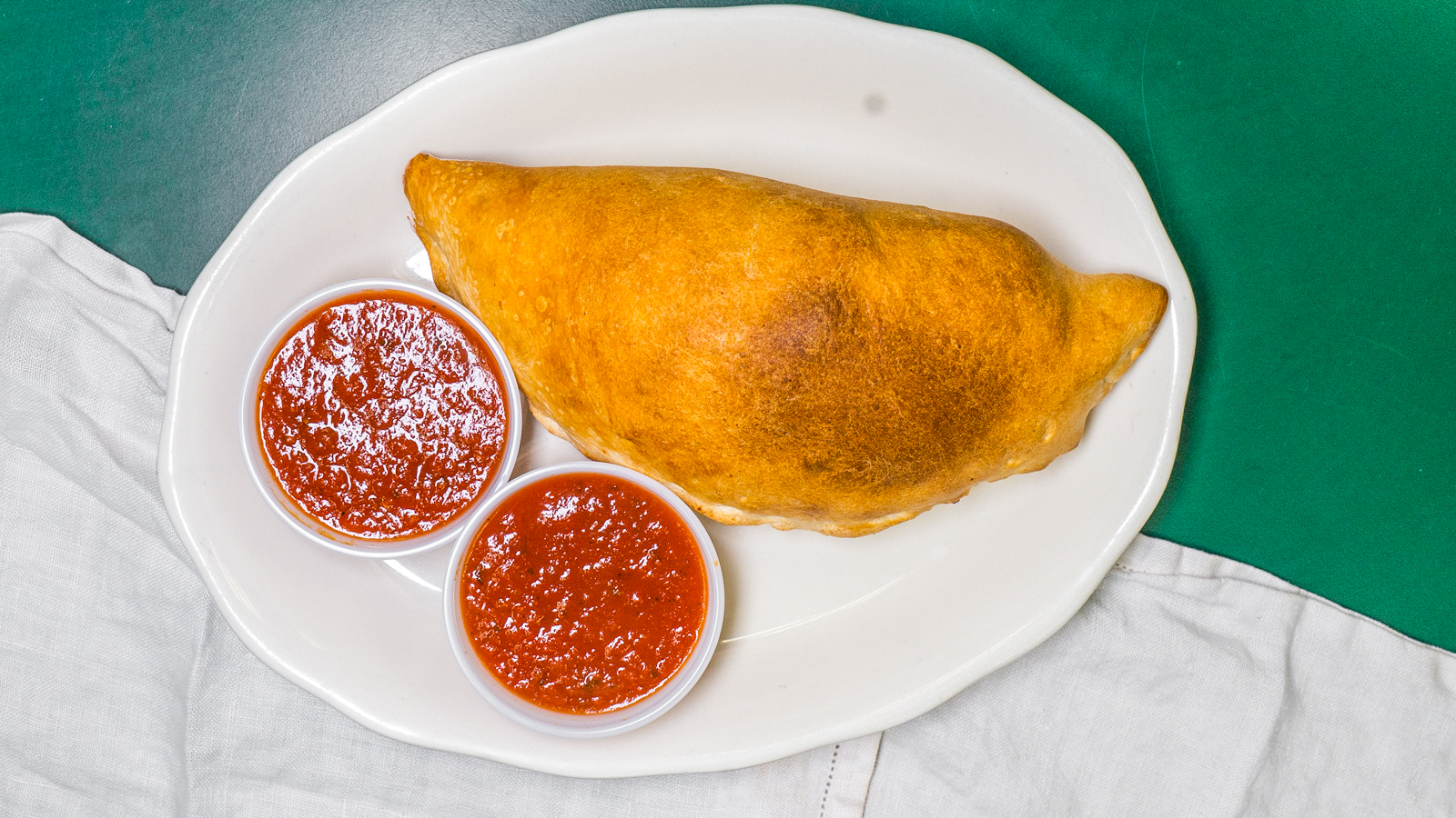 Two Calzones with One Topping
