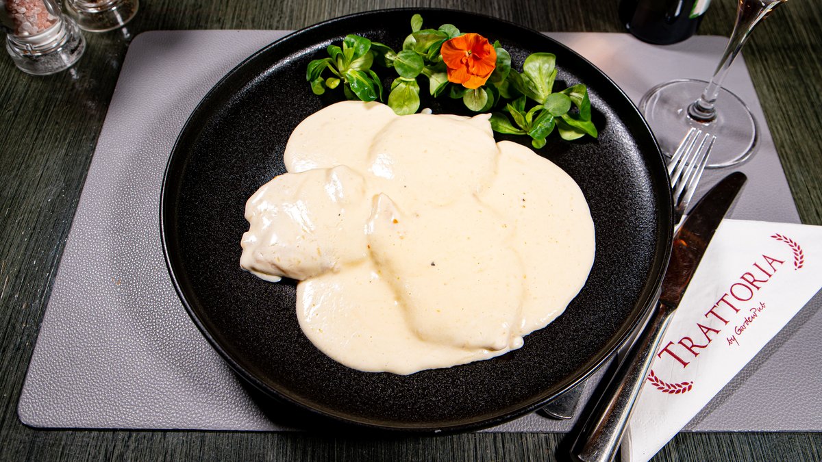Piept de pui în sos de parmezan