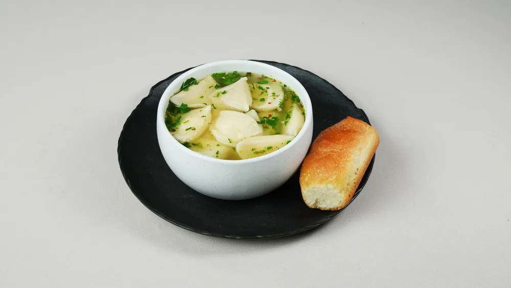 Meat dumplings in broth soup + bread