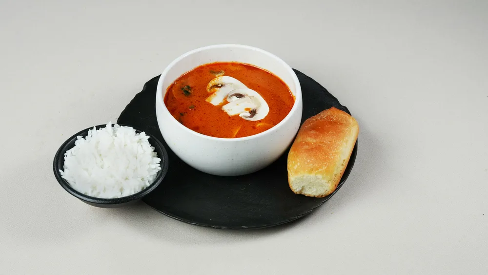 Tom yum with mushrooms + rice + bread