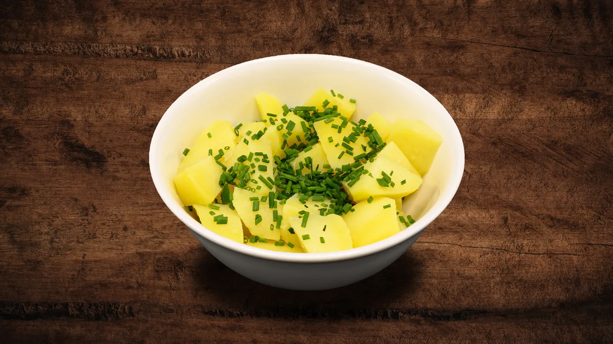 150g Vařené brambory, máslo, pažitka - bez lepku